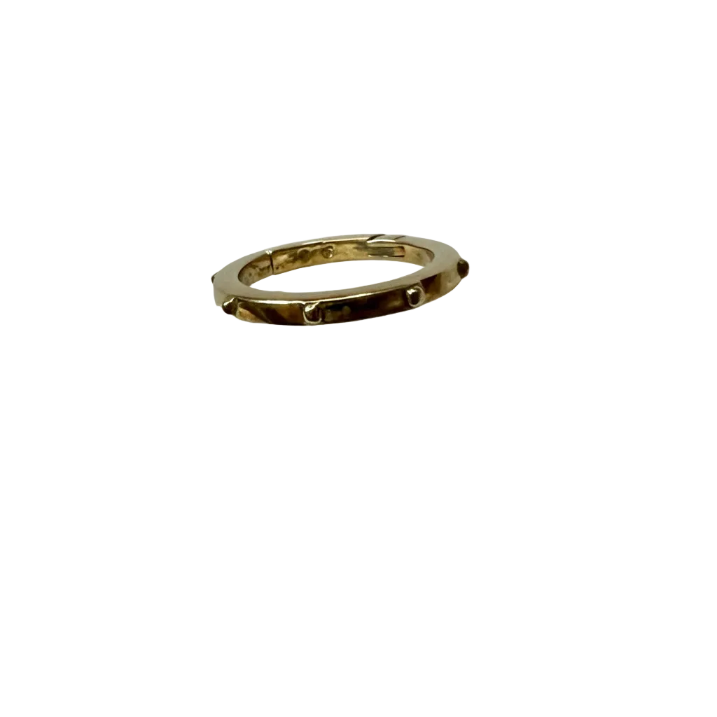 Gold clasp on display prop white background