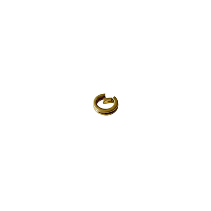 Gold spring ring clasp white background
